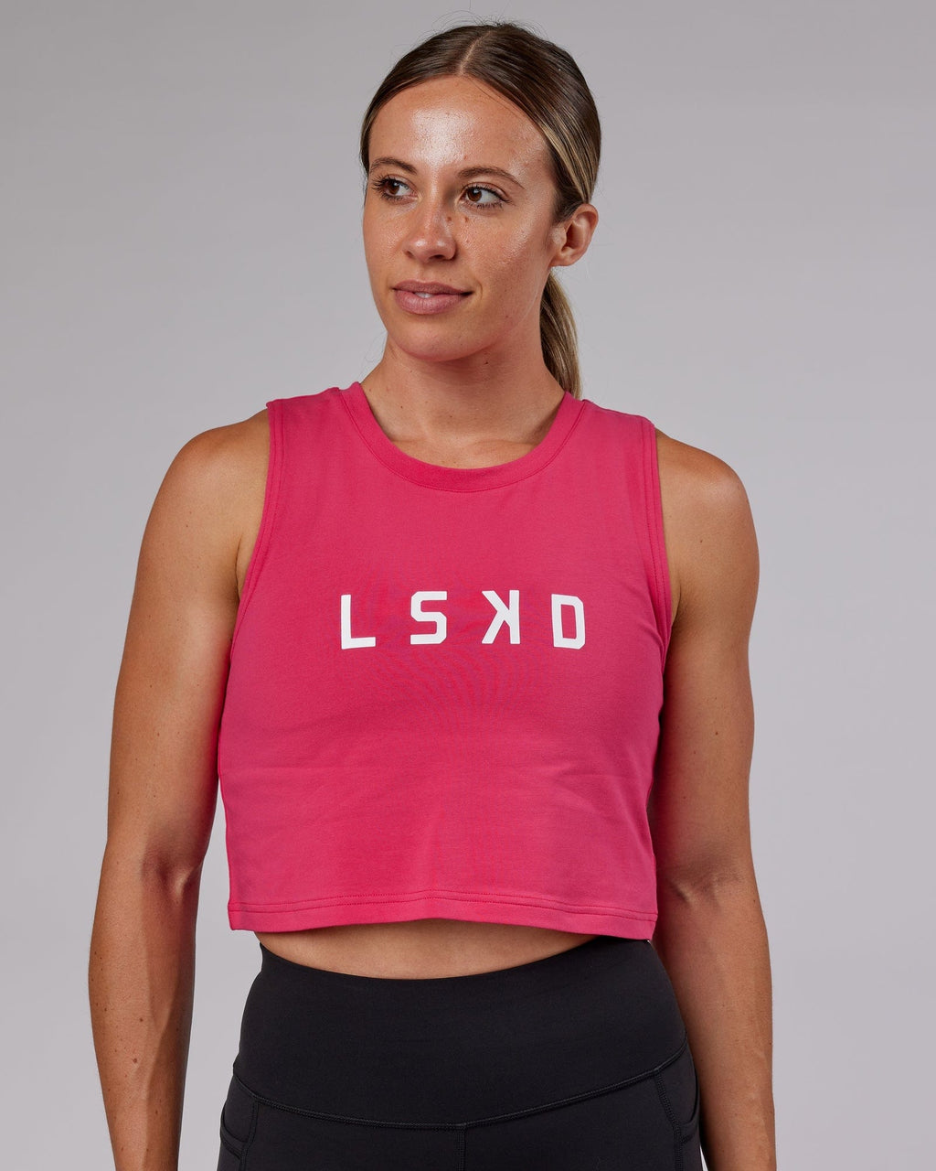 Model wearing Agile FLXCotton Tank - Boysenberry