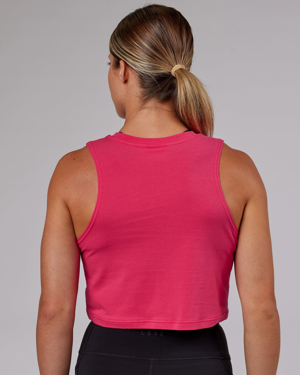 Model wearing Agile FLXCotton Tank - Boysenberry