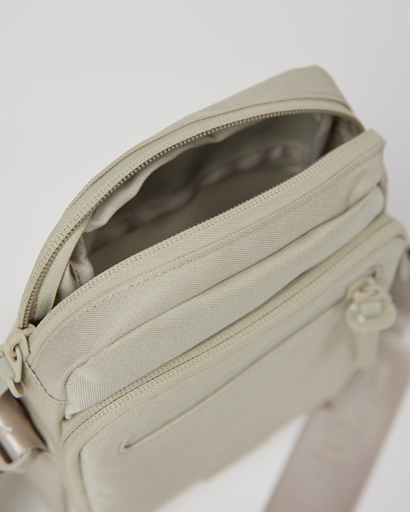 Model wearing All Day Cross Body Bag - Shale Beige