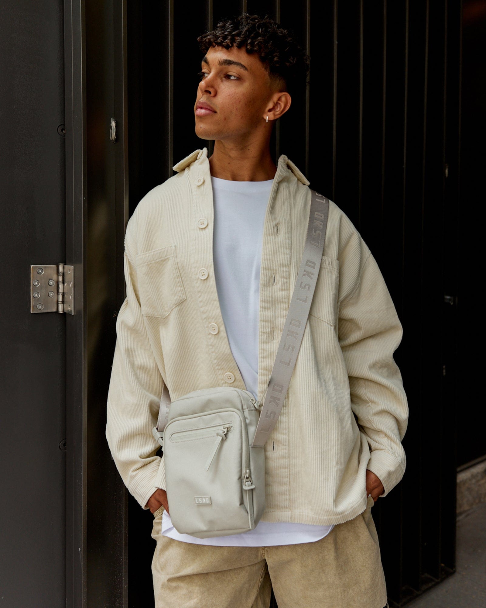 Model wearing All Day Cross Body Bag - Shale Beige