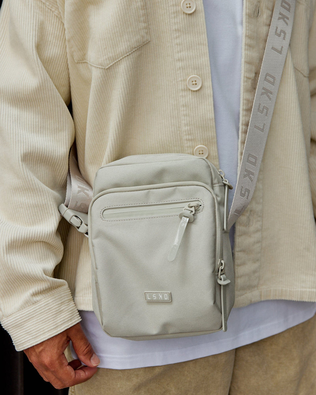 Model wearing All Day Cross Body Bag - Shale Beige