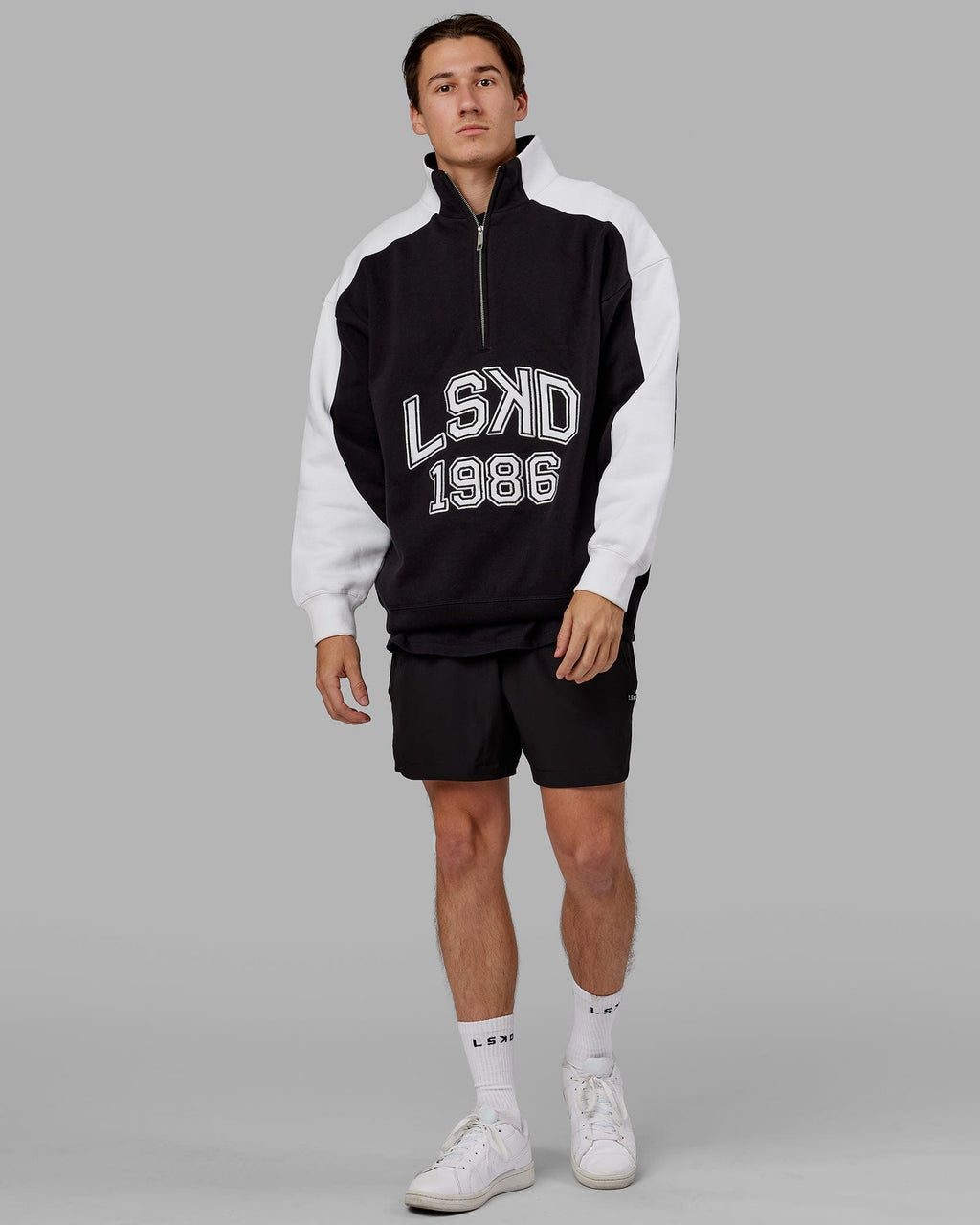 Model wearing Alumni 1/4 Zip Sweater Oversize - Black-White