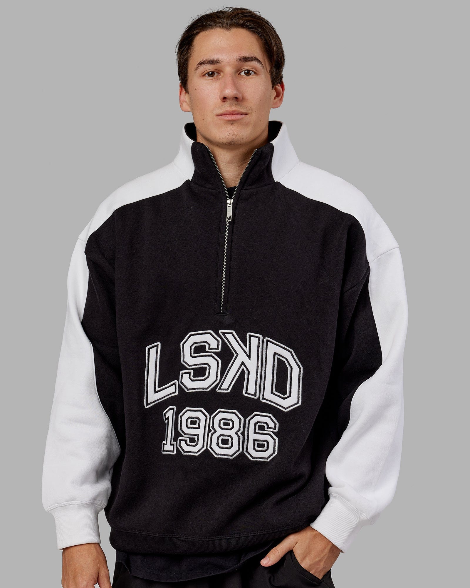 Model wearing Alumni 1/4 Zip Sweater Oversize - Black-White