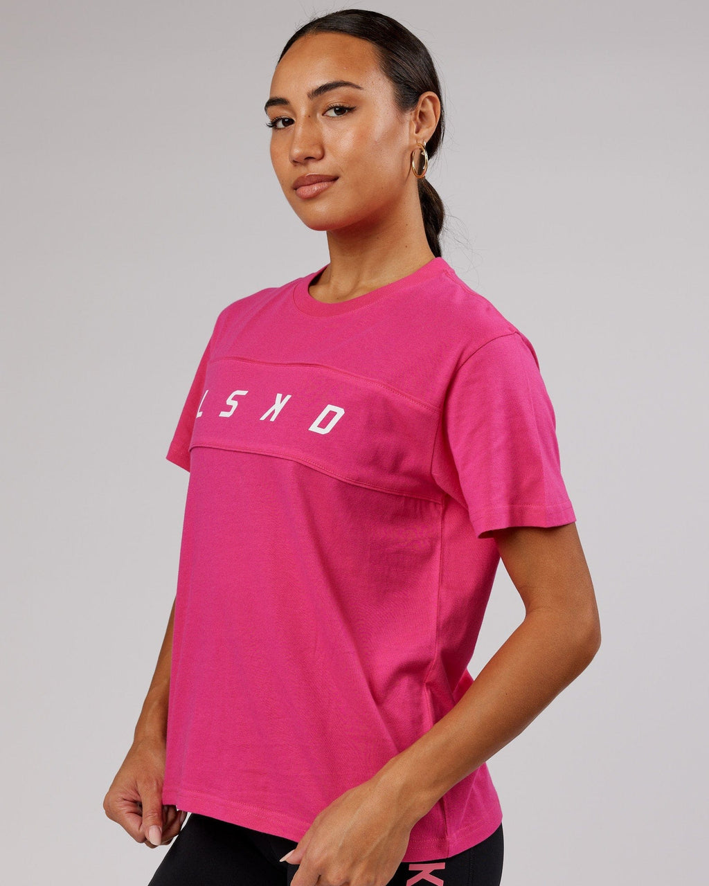 Model wearing Ascent Tee - Magenta
