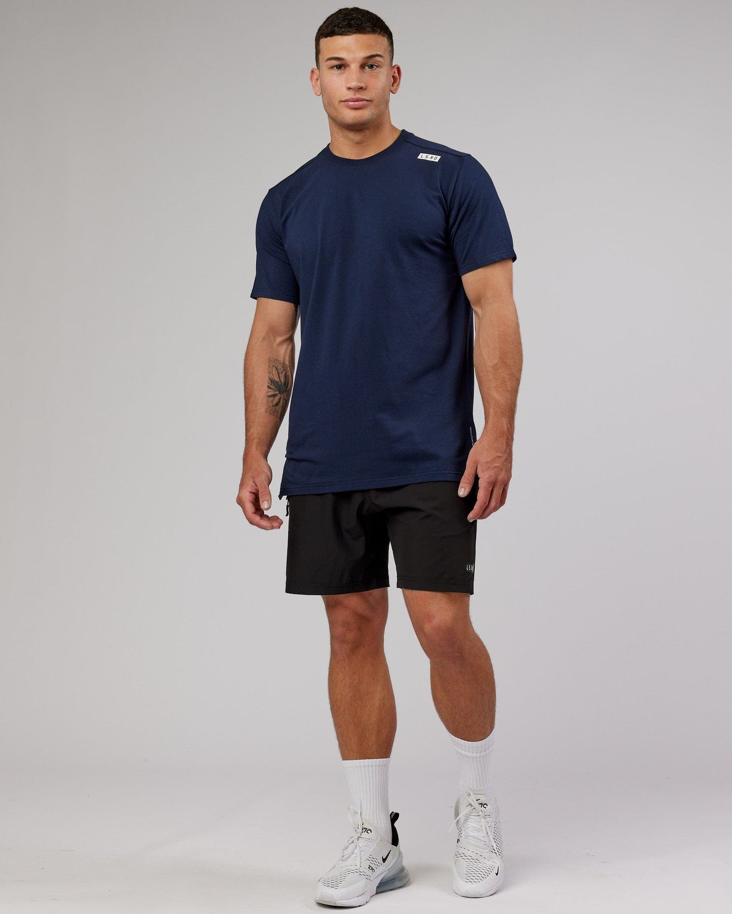 Model wearing Athlete FLXCotton Tee - Navy