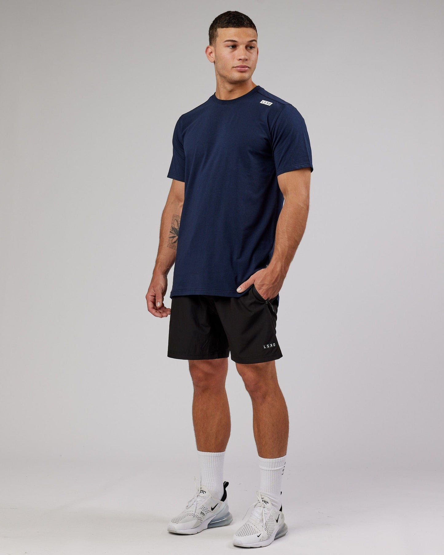 Model wearing Athlete FLXCotton Tee - Navy