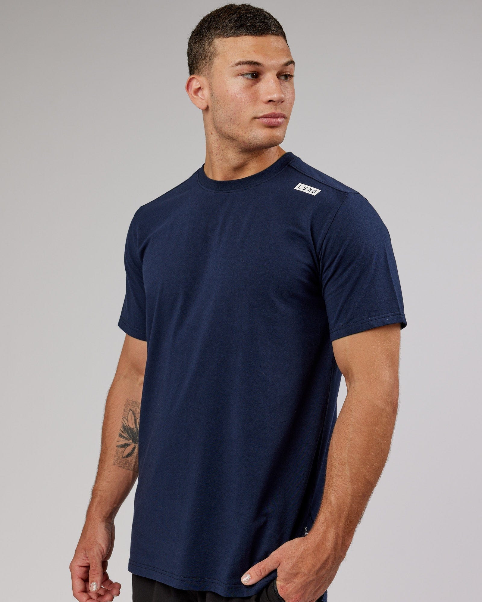 Model wearing Athlete FLXCotton Tee - Navy