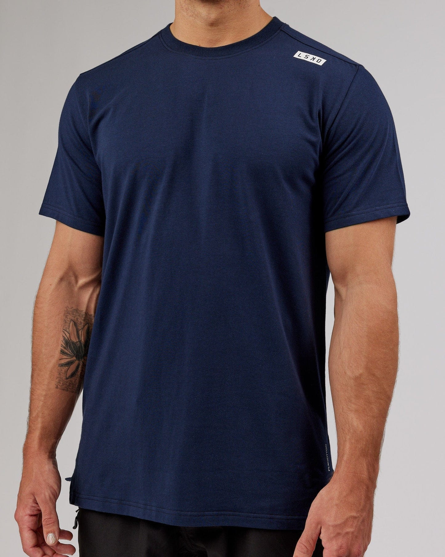 Model wearing Athlete FLXCotton Tee - Navy
