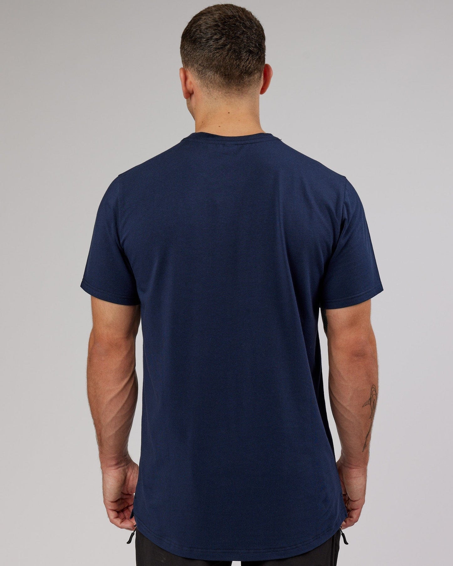 Model wearing Athlete FLXCotton Tee - Navy