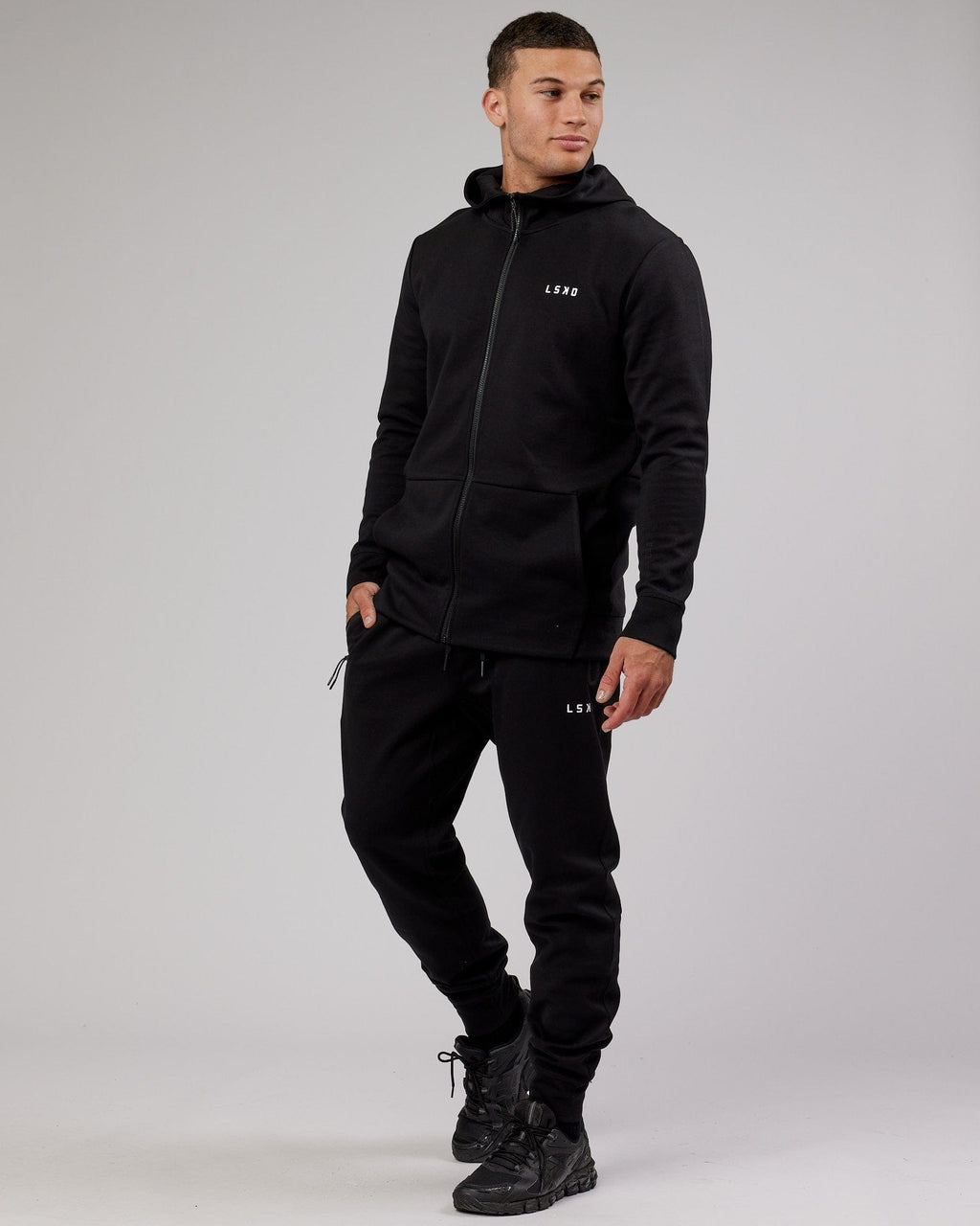 Model wearing Athlete ForgedFleece Zip Up Hoodie - Black