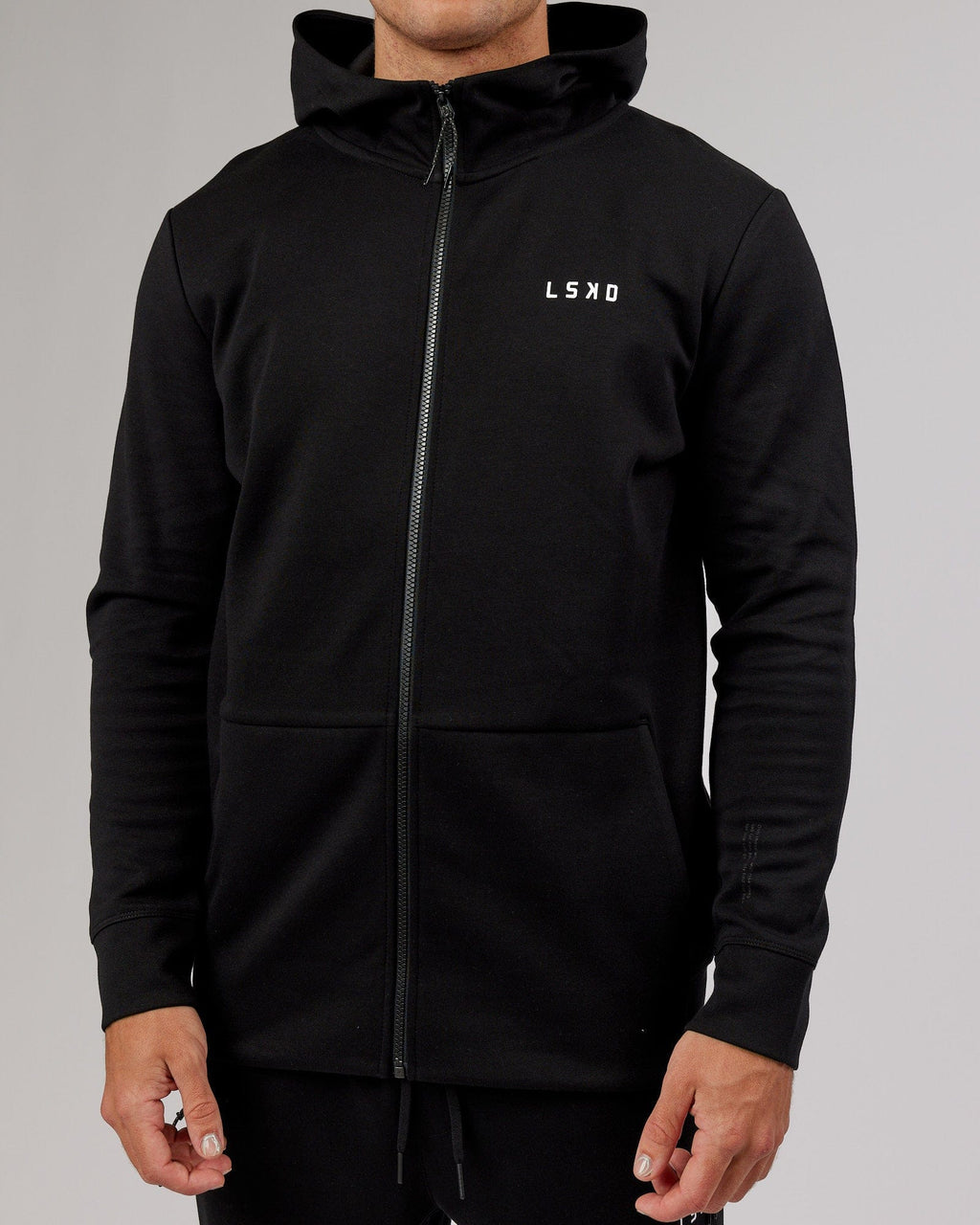 Model wearing Athlete ForgedFleece Zip Up Hoodie - Black