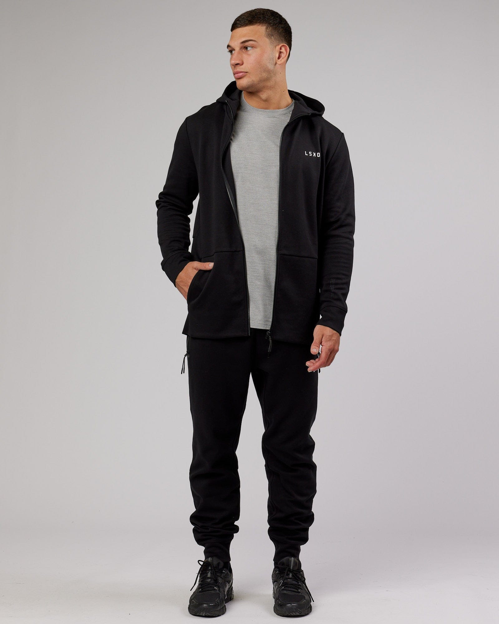 Model wearing Athlete ForgedFleece Zip Up Hoodie - Black