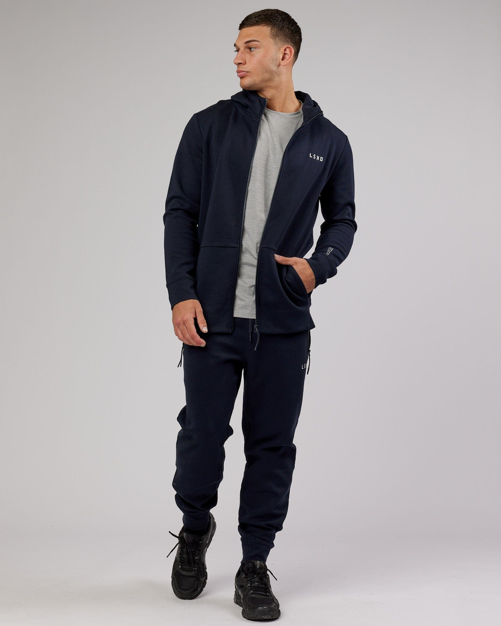 Model wearing Athlete ForgedFleece Zip Up Hoodie - Dark Navy