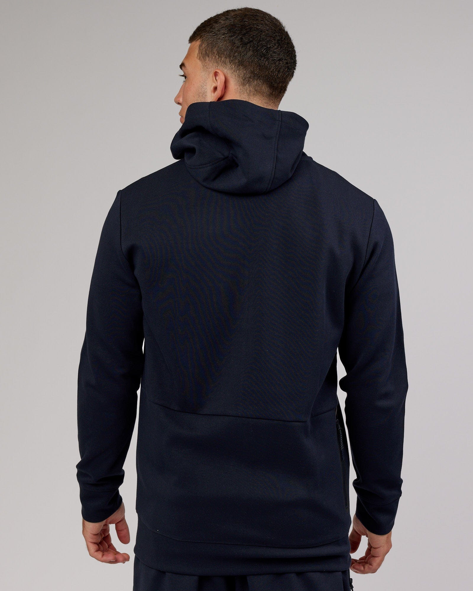 Model wearing Athlete ForgedFleece Zip Up Hoodie - Dark Navy