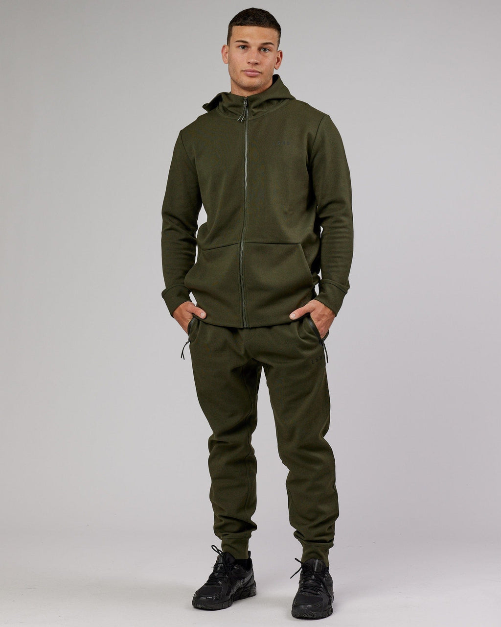 Model wearing Athlete ForgedFleece Zip Up Hoodie - Forest Night