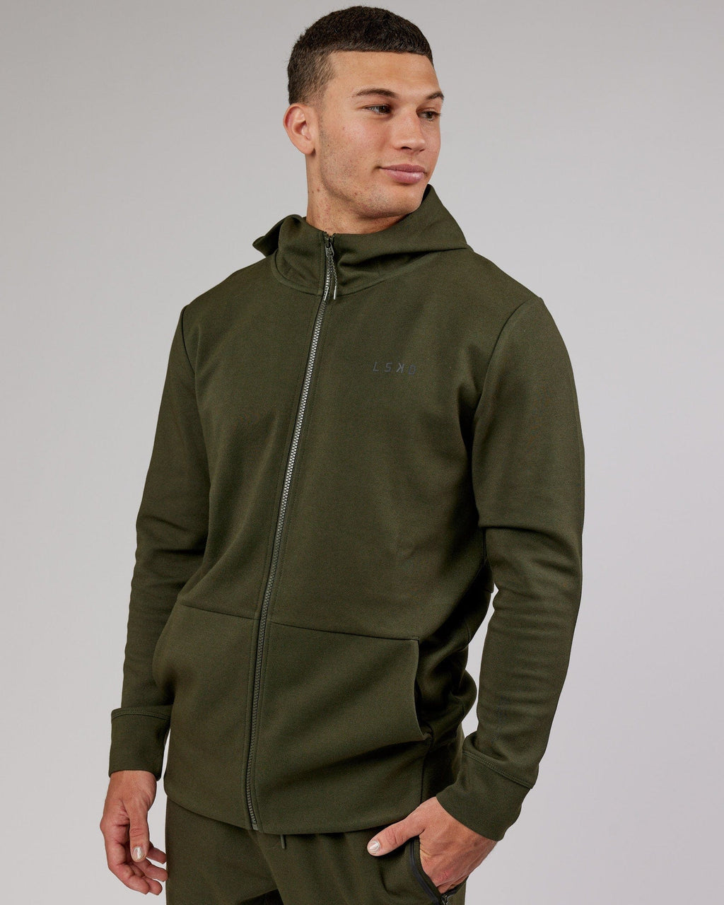 Model wearing Athlete ForgedFleece Zip Up Hoodie - Forest Night