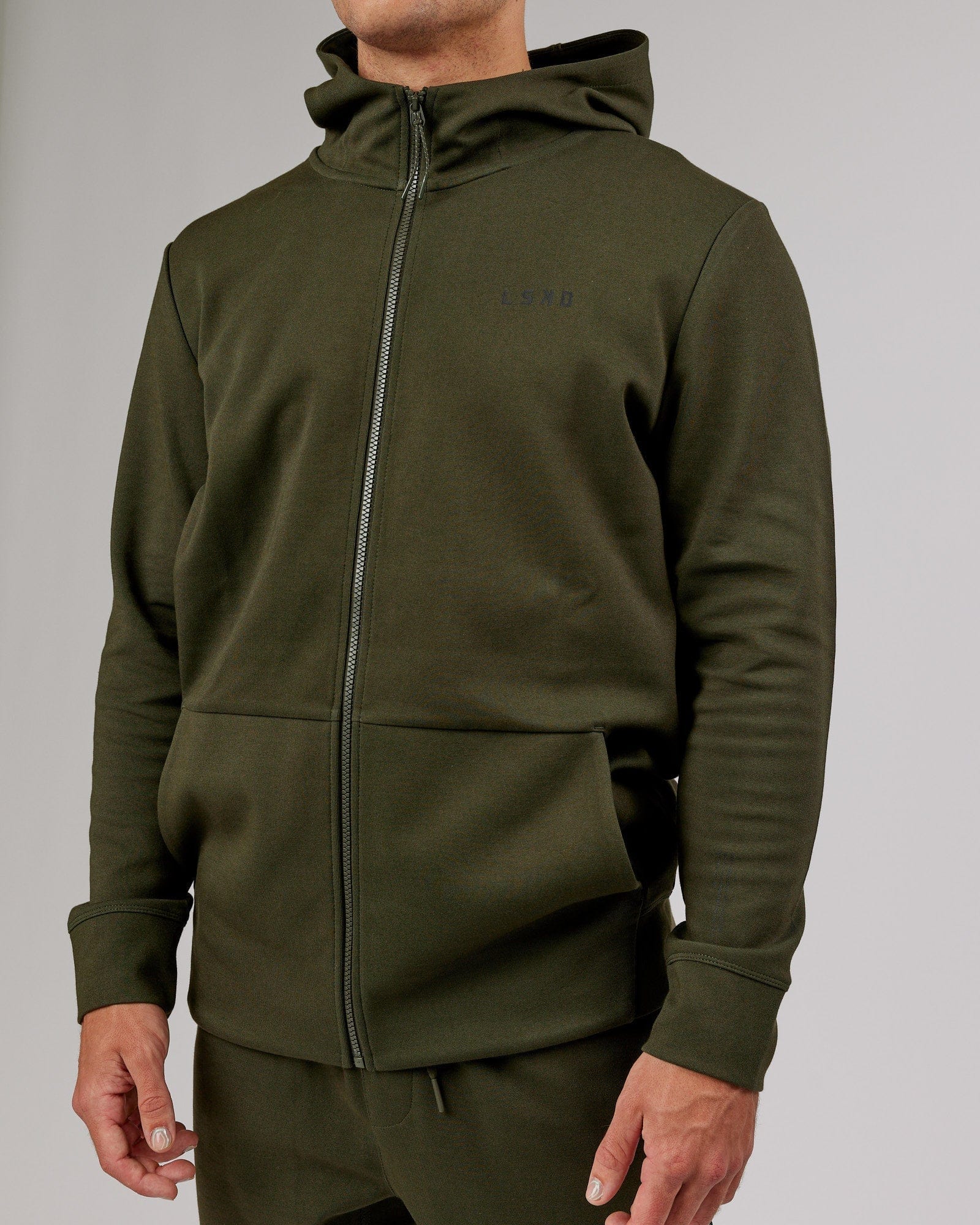 Model wearing Athlete ForgedFleece Zip Up Hoodie - Forest Night