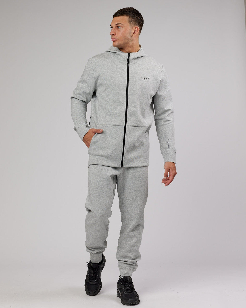 Model wearing Athlete ForgedFleece Zip Up Hoodie - Lt Grey Marl