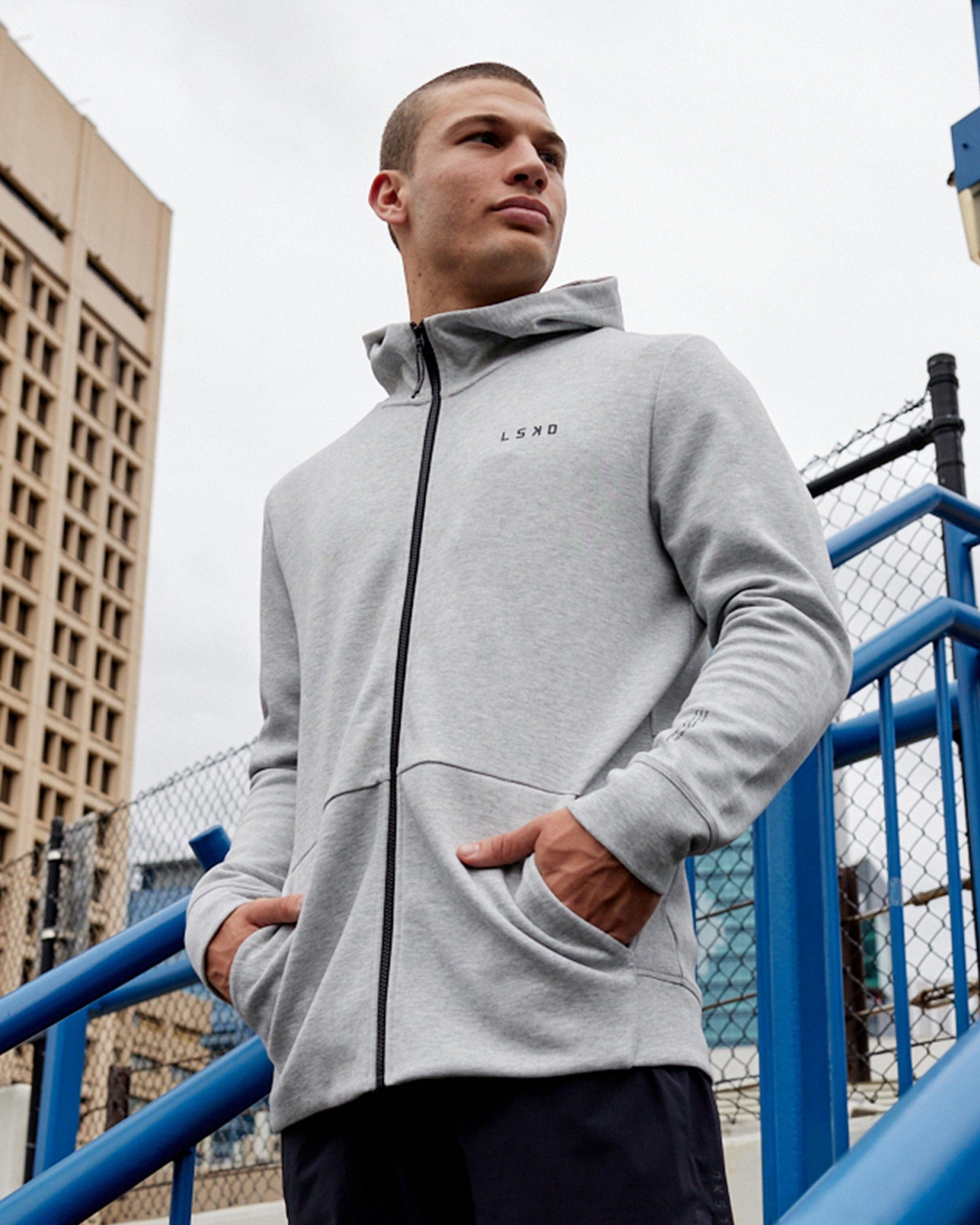 Model wearing Athlete ForgedFleece Zip Up Hoodie - Lt Grey Marl