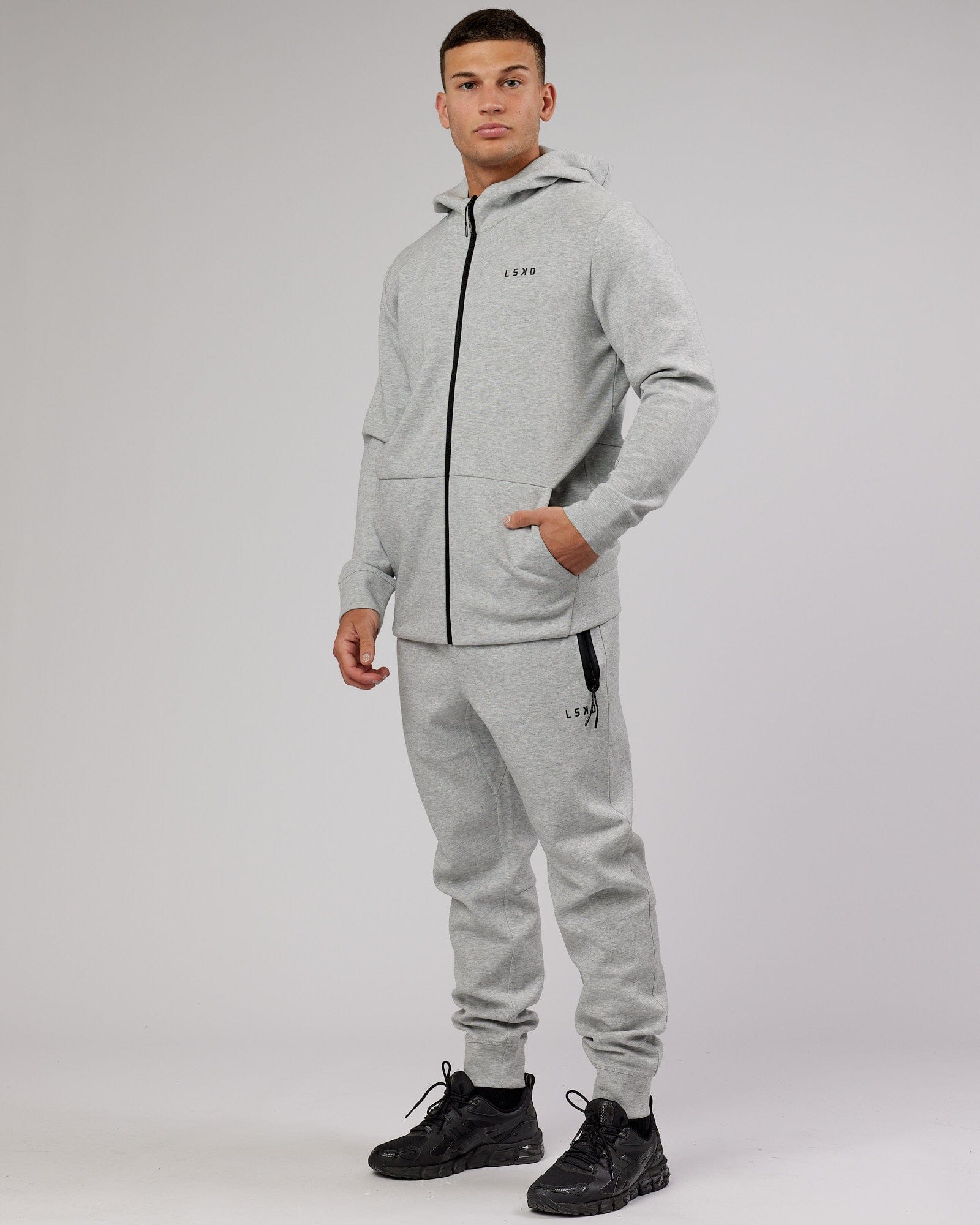Model wearing Athlete ForgedFleece Zip Up Hoodie - Lt Grey Marl