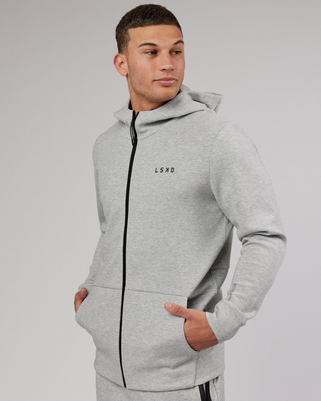 Model wearing Athlete ForgedFleece Zip Up Hoodie - Lt Grey Marl