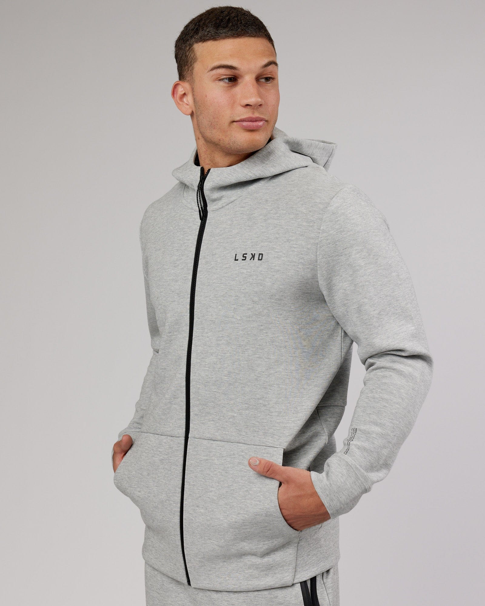 Model wearing Athlete ForgedFleece Zip Up Hoodie - Lt Grey Marl