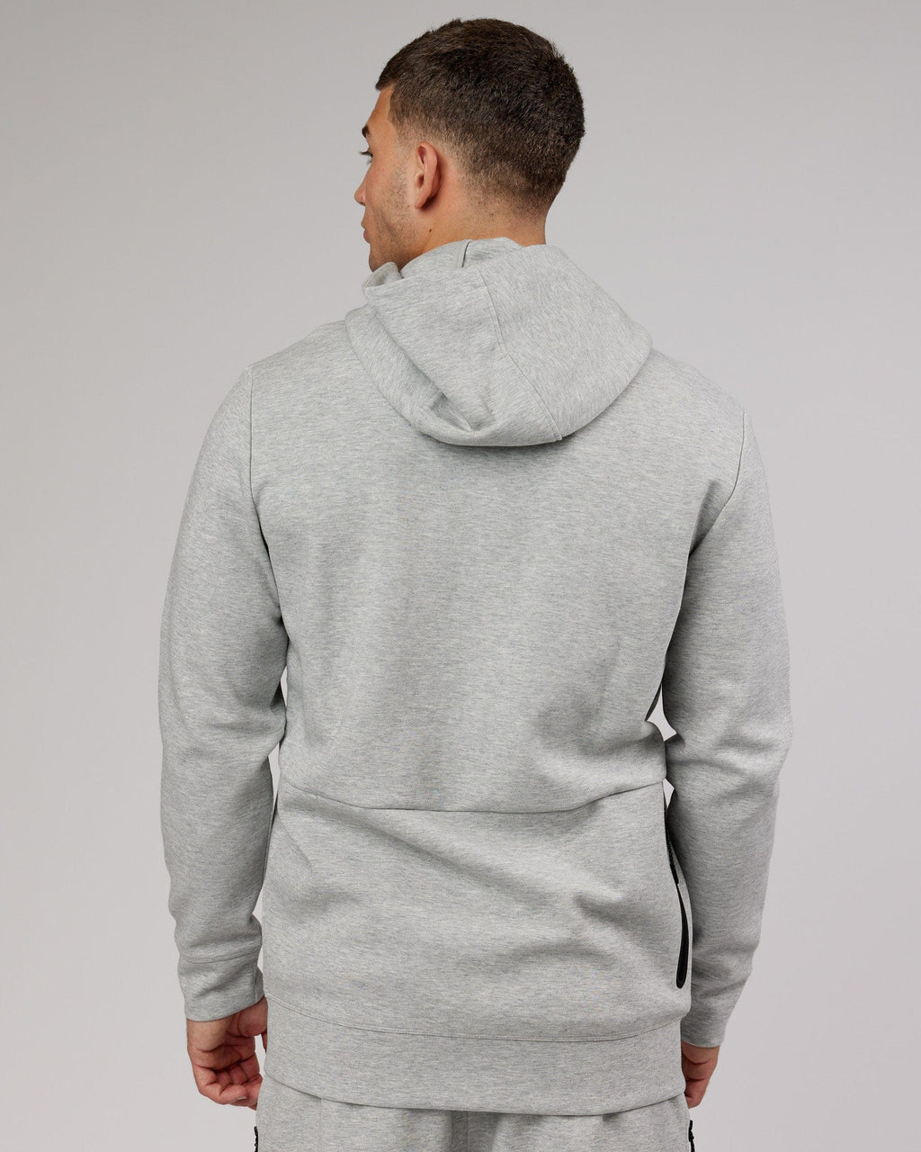 Model wearing Athlete ForgedFleece Zip Up Hoodie - Lt Grey Marl