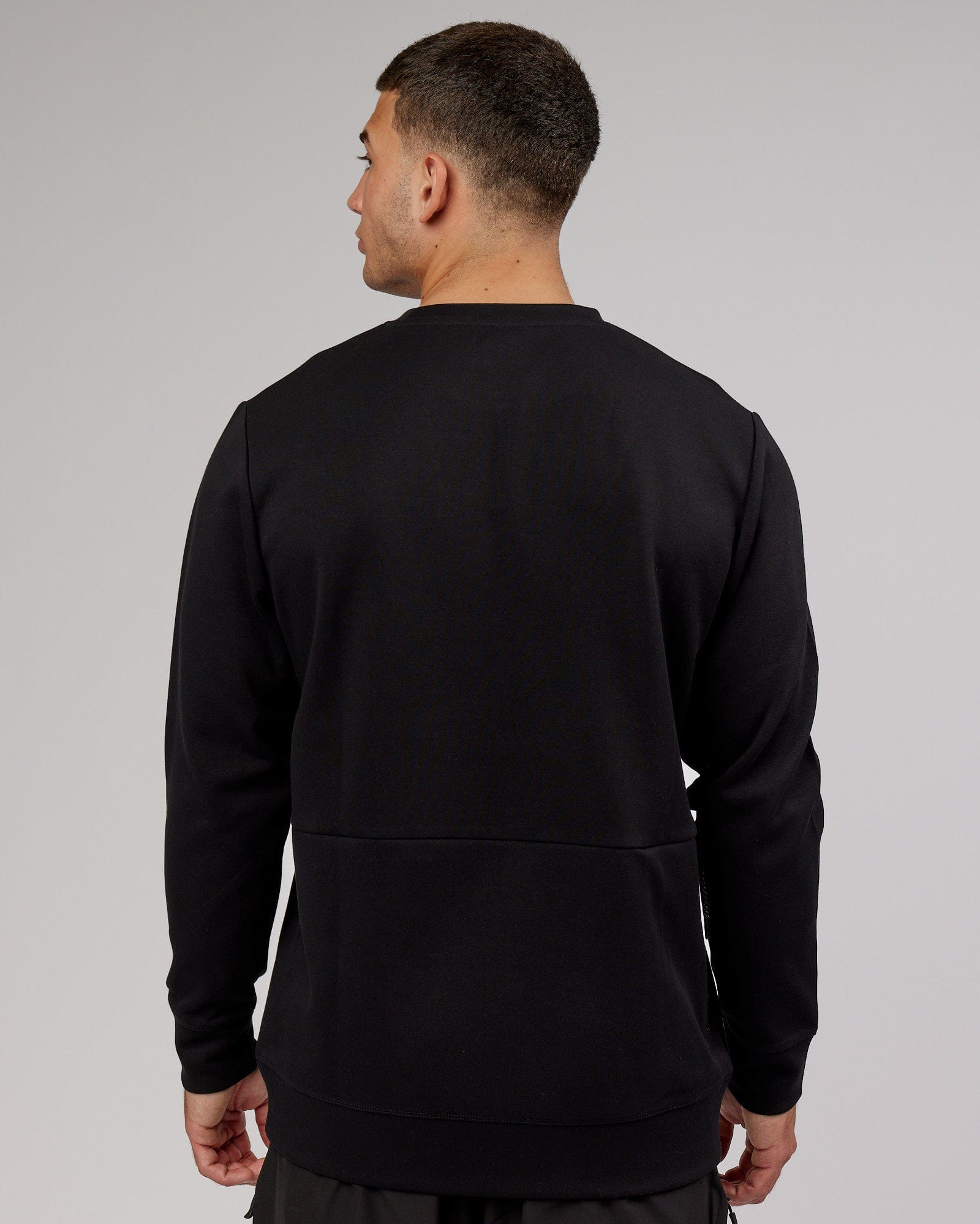 Model wearing Athlete ForgedFleece Sweater - Black