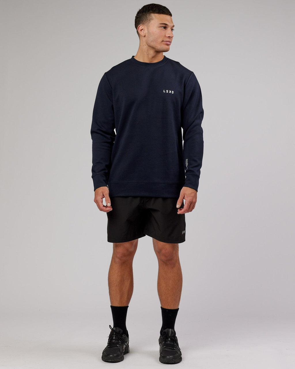 Model wearing Athlete ForgedFleece Sweater - Dark Navy