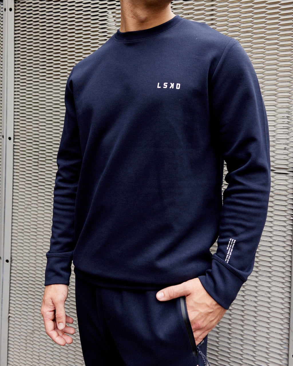 Model wearing Athlete ForgedFleece Sweater - Dark Navy