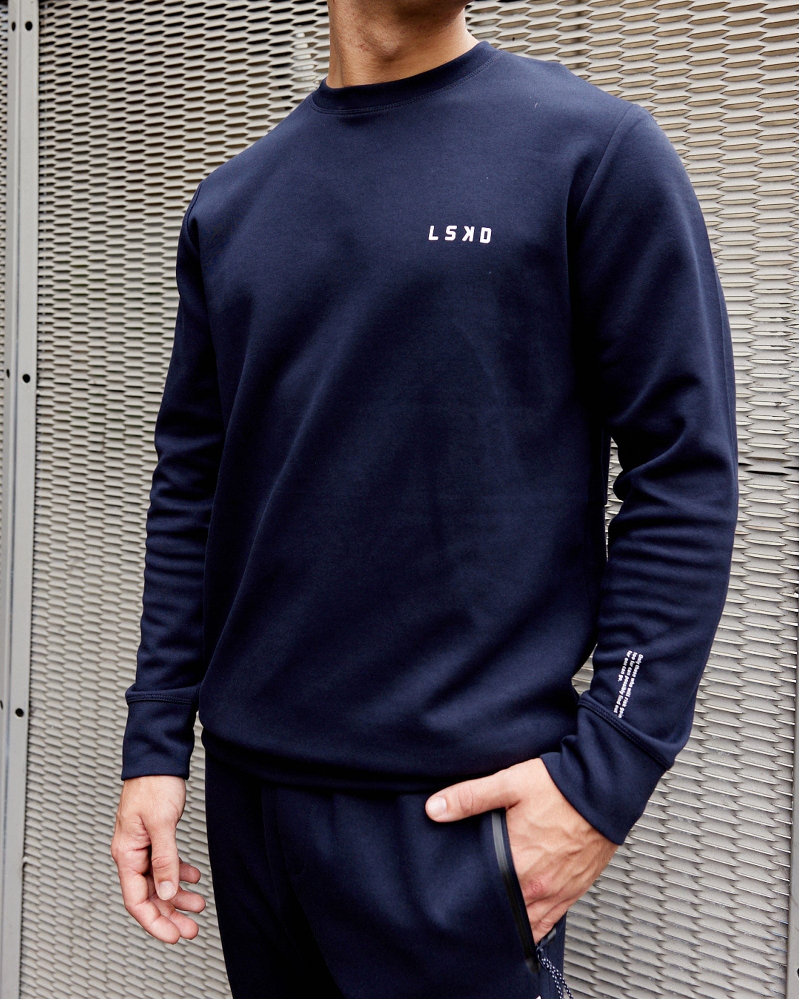 Model wearing Athlete ForgedFleece Sweater - Dark Navy