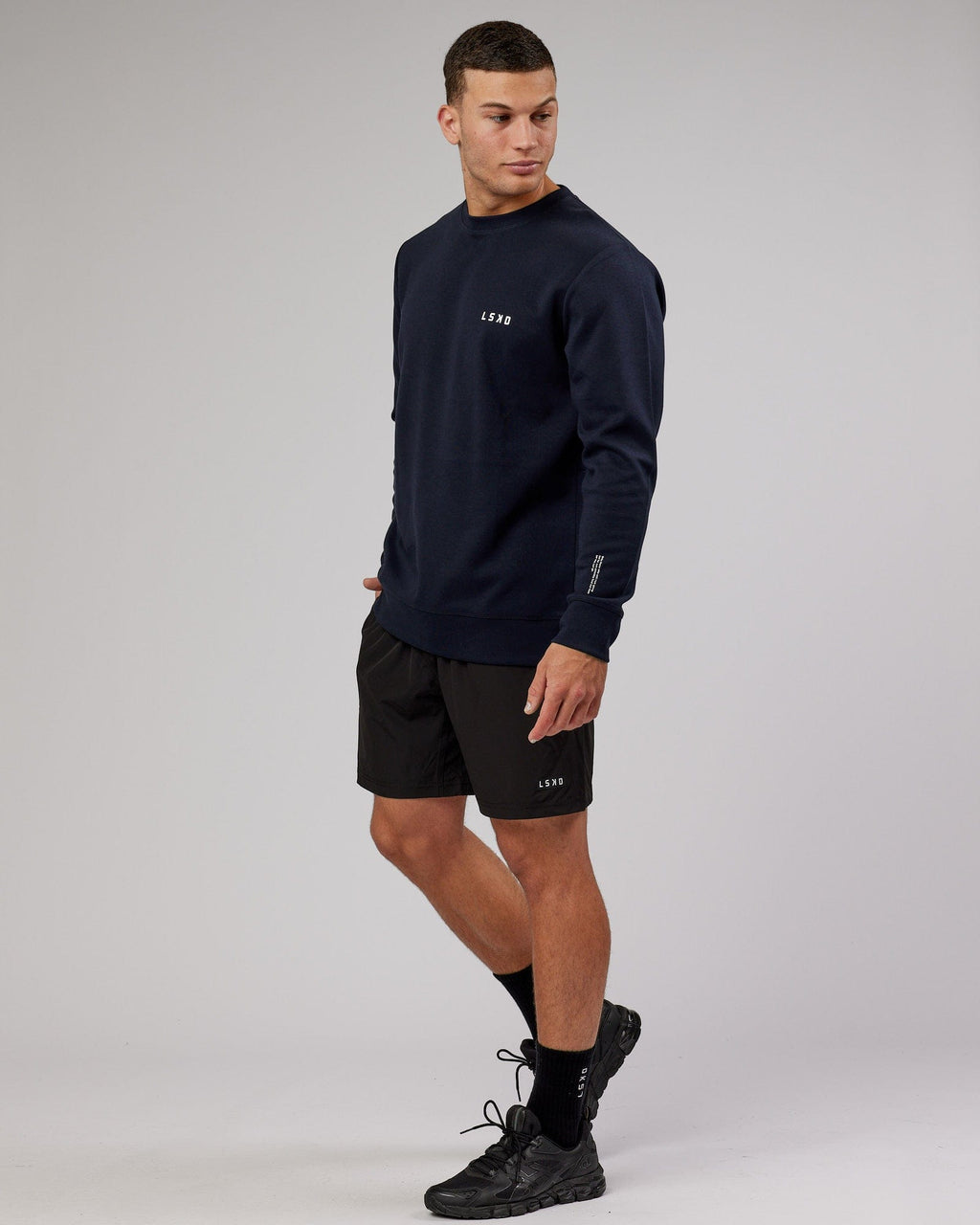 Model wearing Athlete ForgedFleece Sweater - Dark Navy
