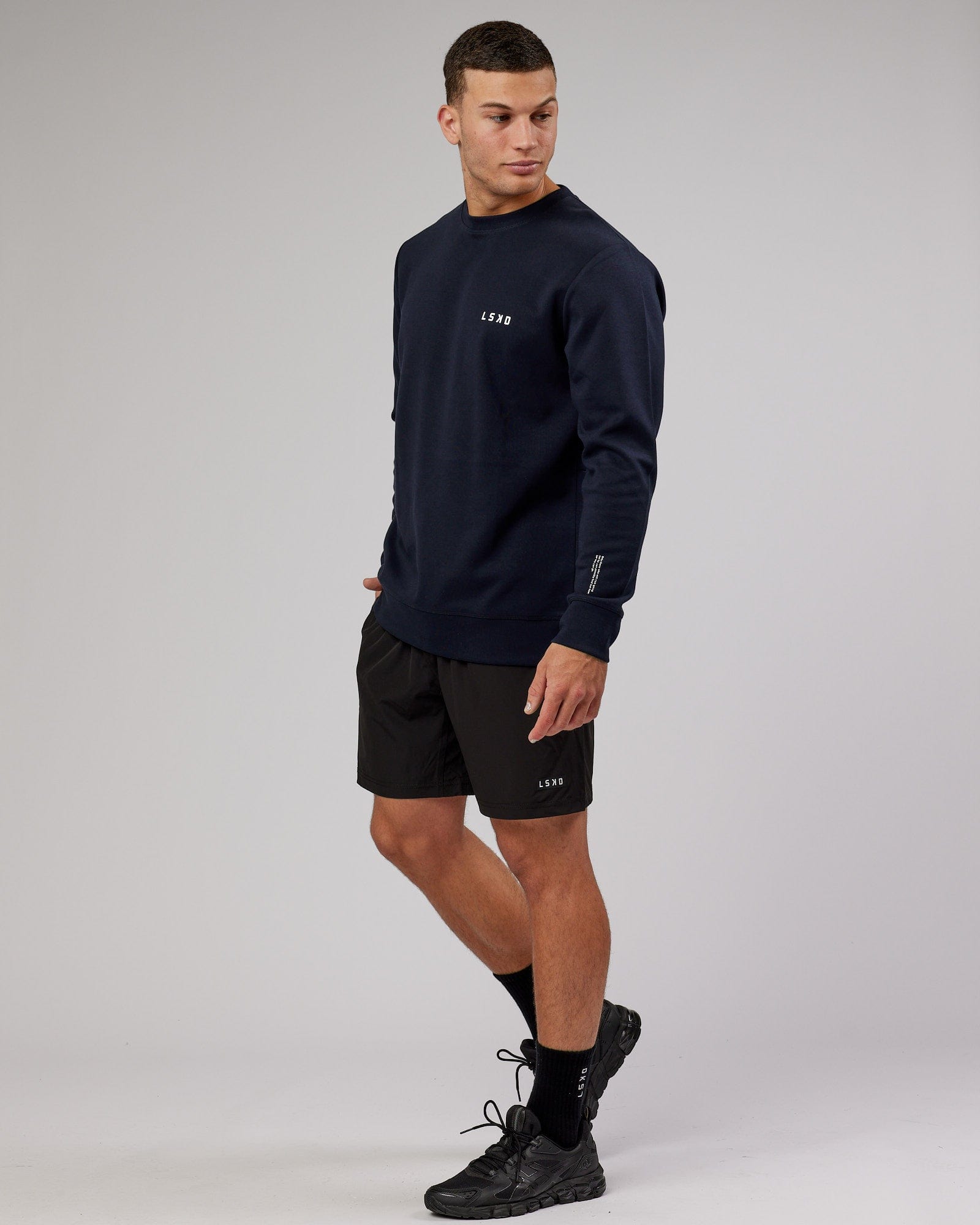 Model wearing Athlete ForgedFleece Sweater - Dark Navy