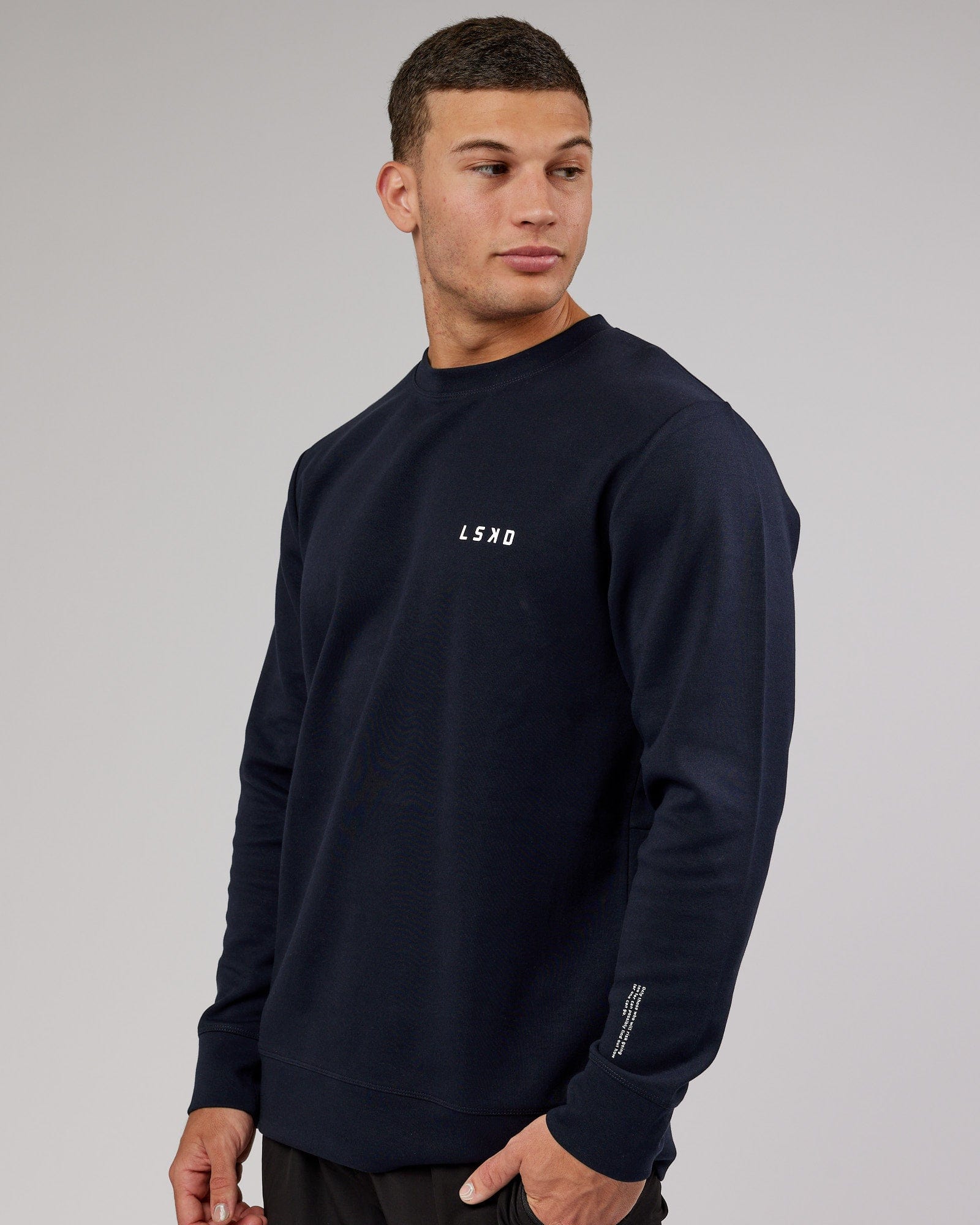 Model wearing Athlete ForgedFleece Sweater - Dark Navy