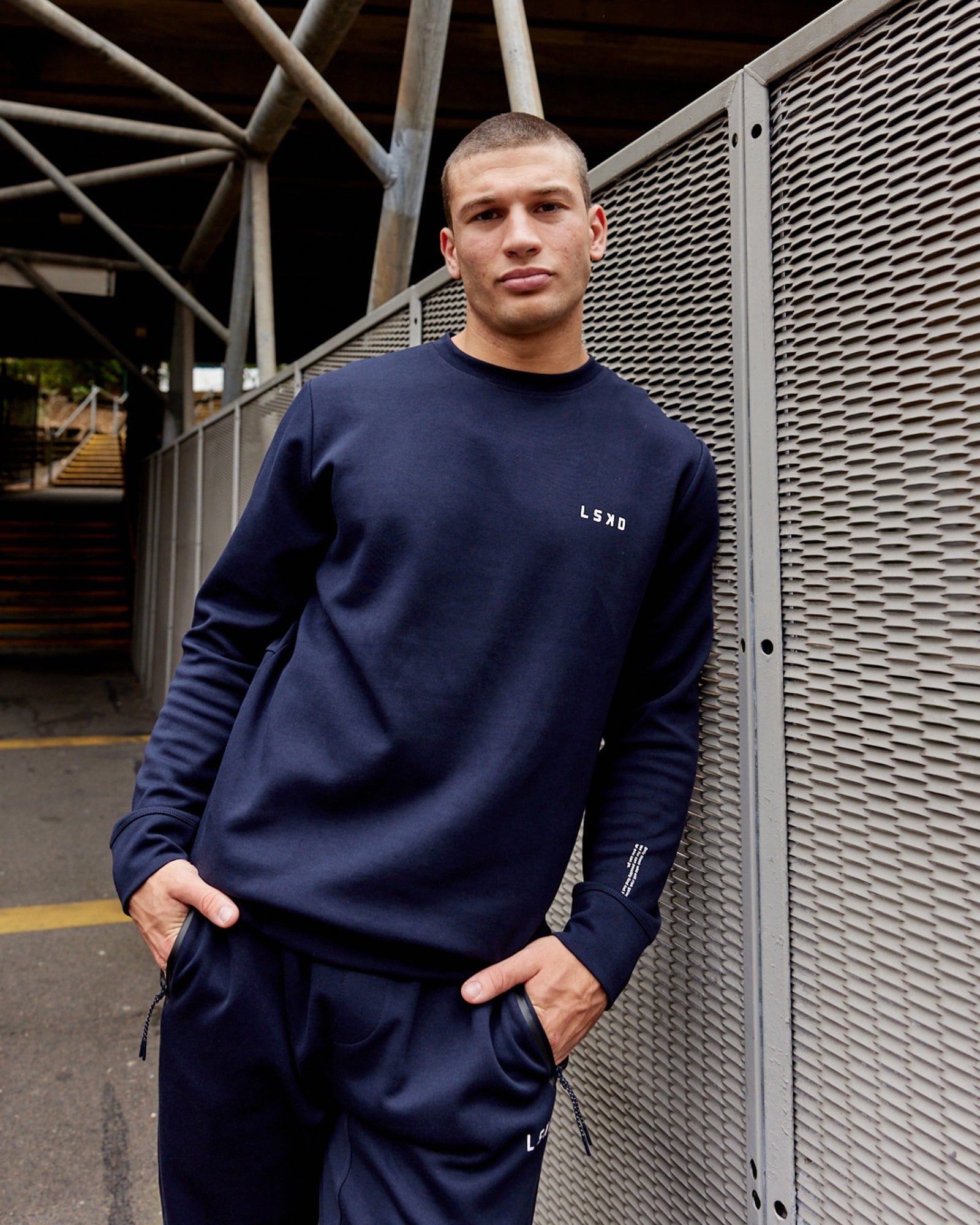 Model wearing Athlete ForgedFleece Sweater - Dark Navy
