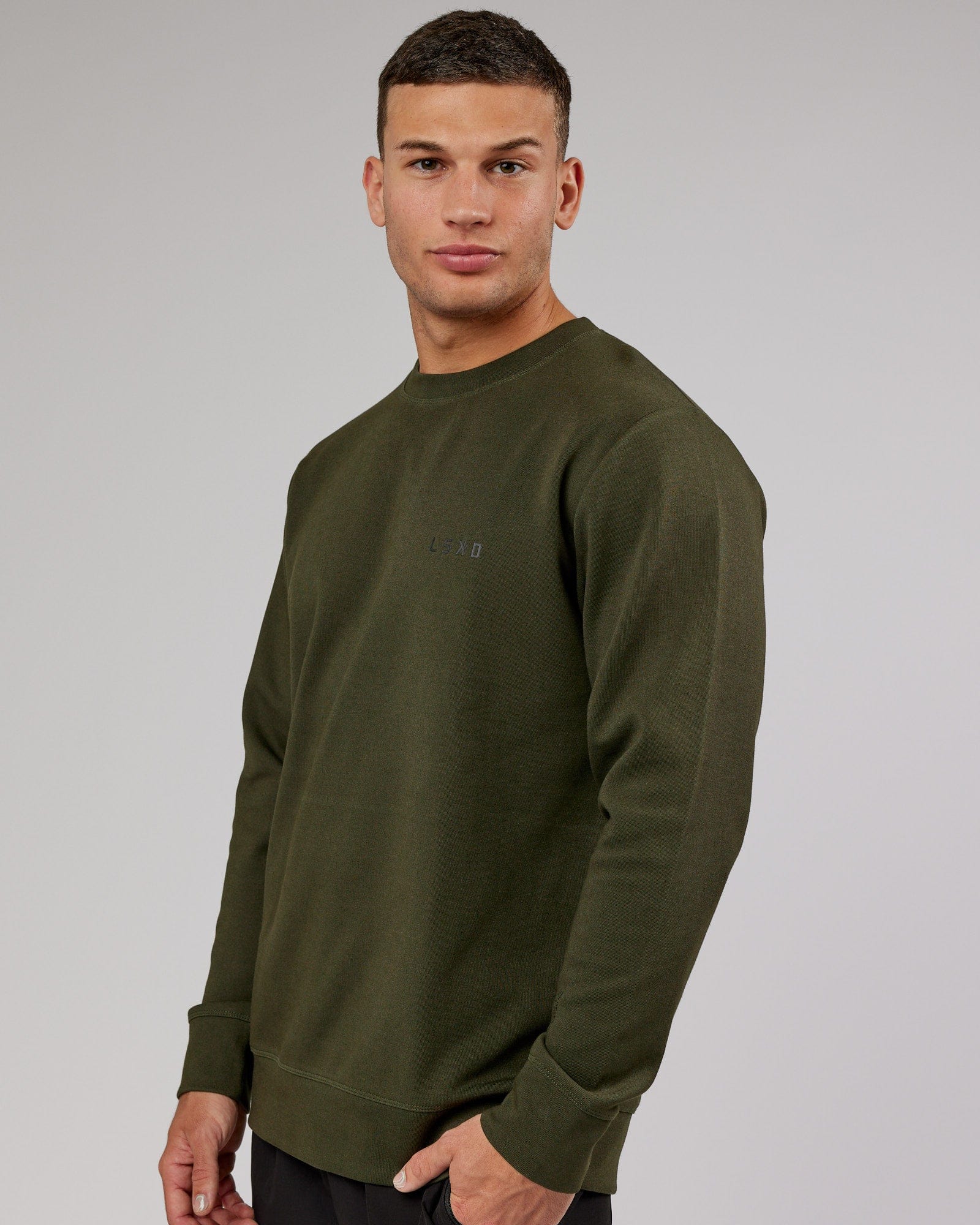 Model wearing Athlete ForgedFleece Sweater - Forest Night