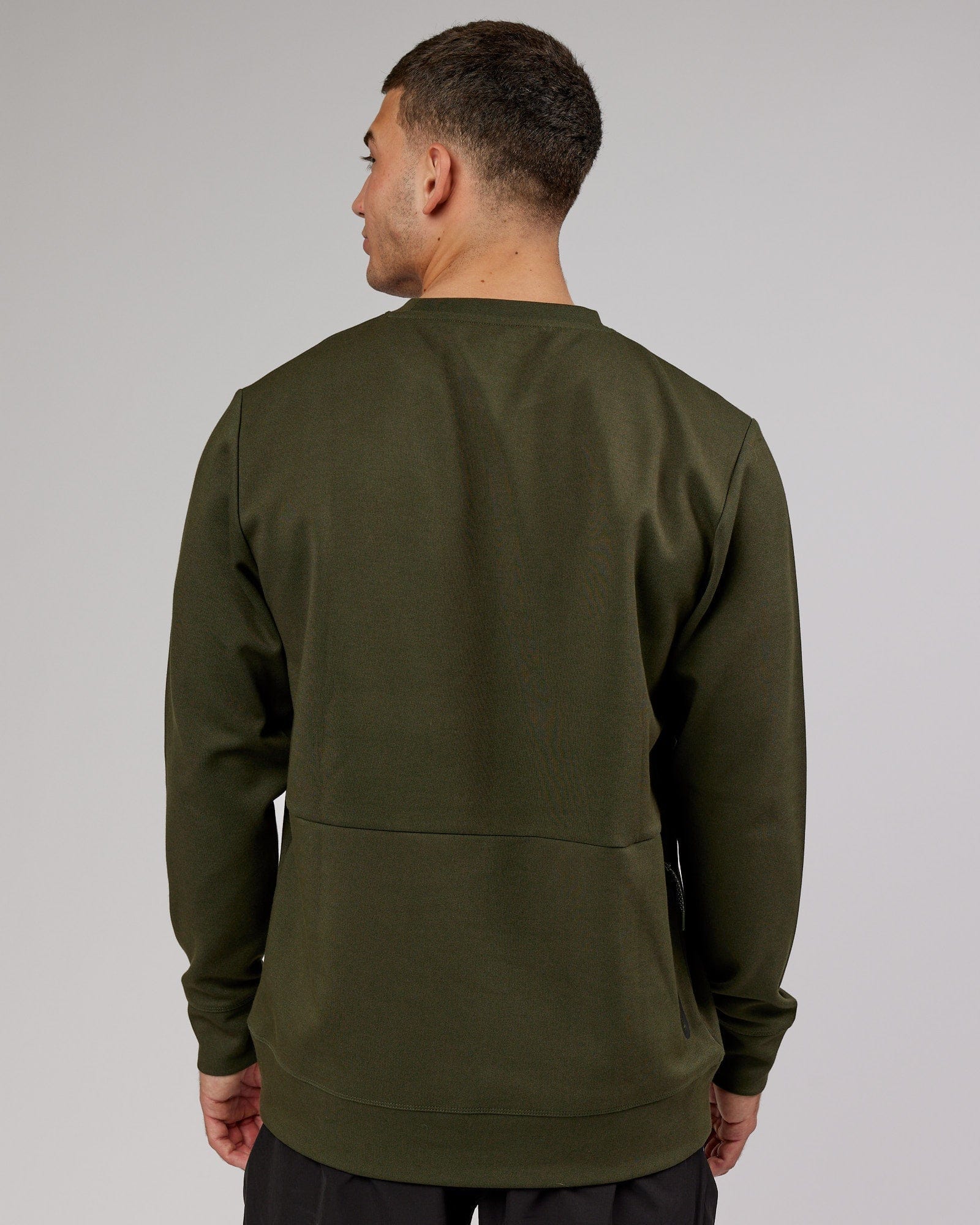 Model wearing Athlete ForgedFleece Sweater - Forest Night