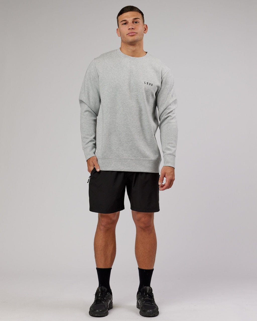 Model wearing Athlete ForgedFleece Sweater - Lt Grey Marl