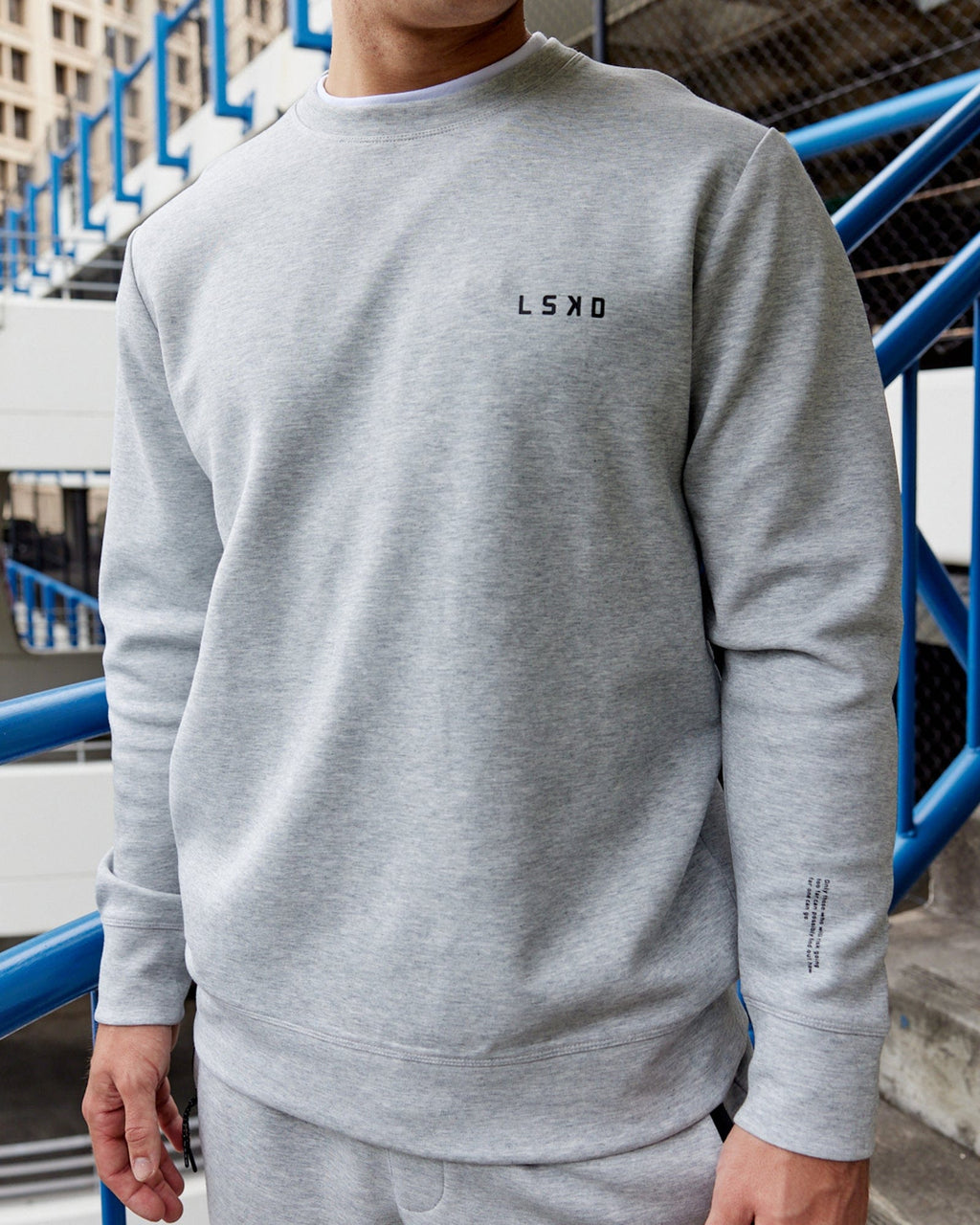 Model wearing Athlete ForgedFleece Sweater - Lt Grey Marl