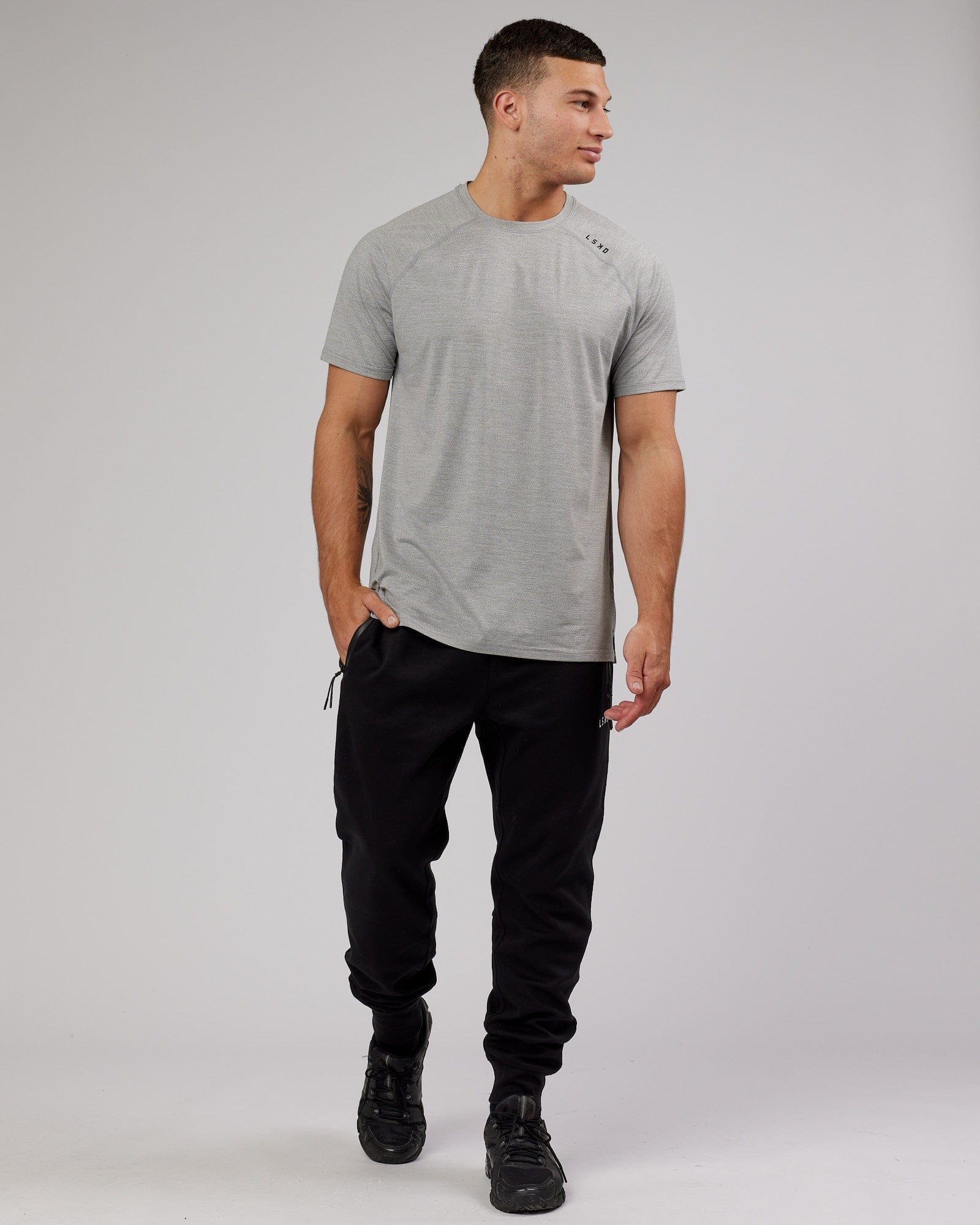 Model wearing Athlete ForgedFleece Zip Trackpant - Black