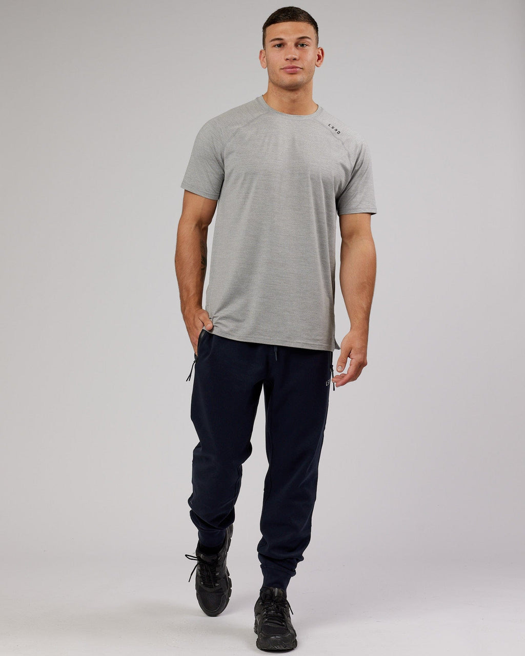 Model wearing Athlete ForgedFleece Zip Trackpant - Dark Navy