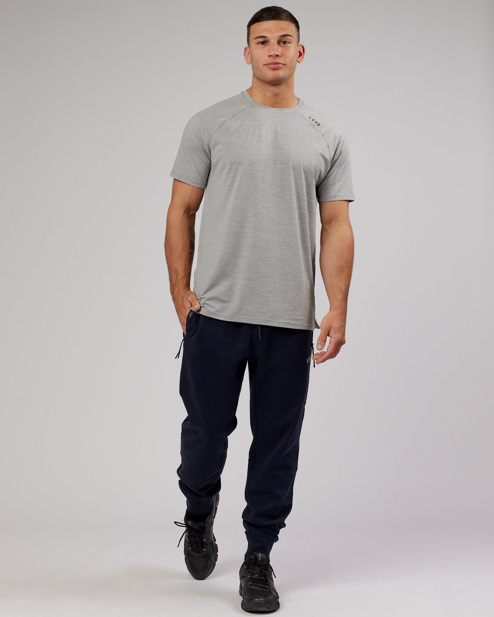 Model wearing Athlete ForgedFleece Zip Trackpant - Dark Navy