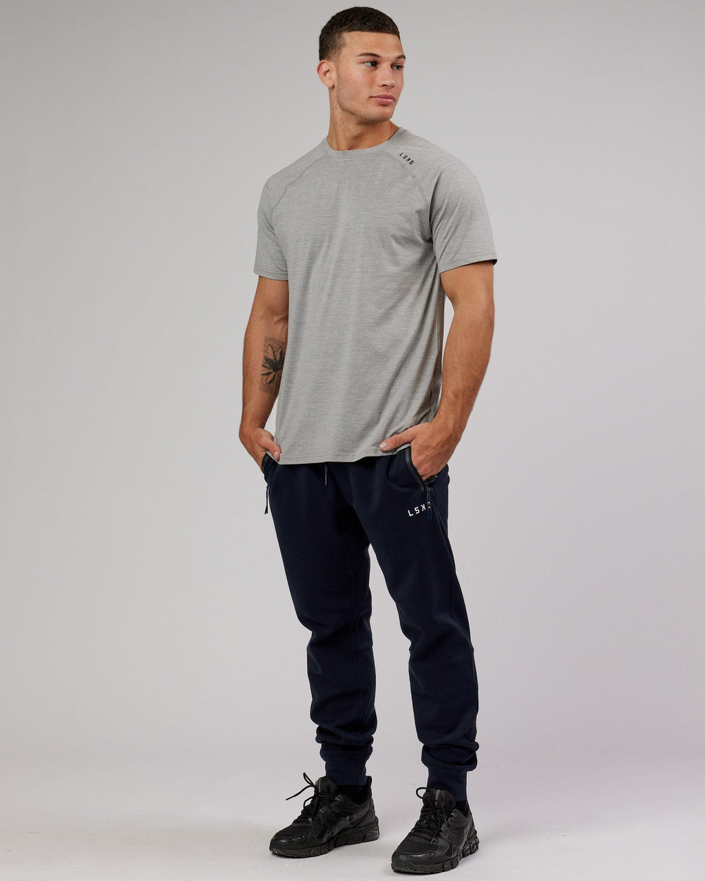 Model wearing Athlete ForgedFleece Zip Trackpant - Dark Navy
