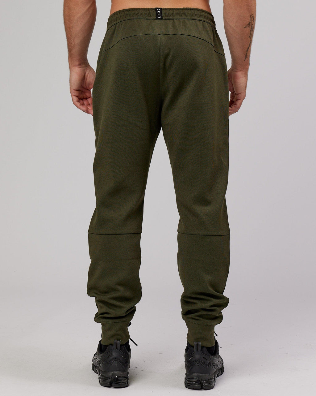 Model wearing Athlete ForgedFleece Zip Trackpant - Forest Night