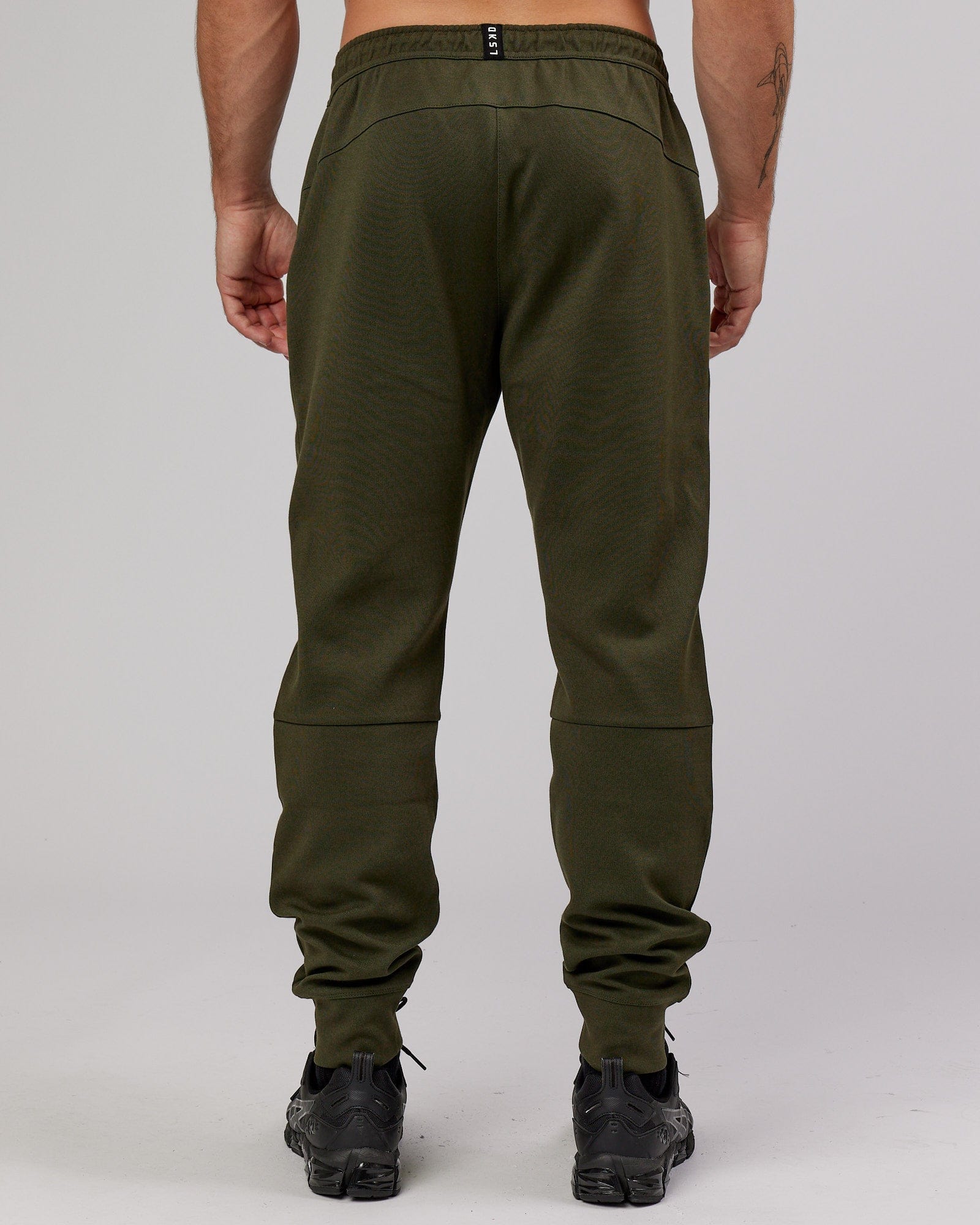 Model wearing Athlete ForgedFleece Zip Trackpant - Forest Night