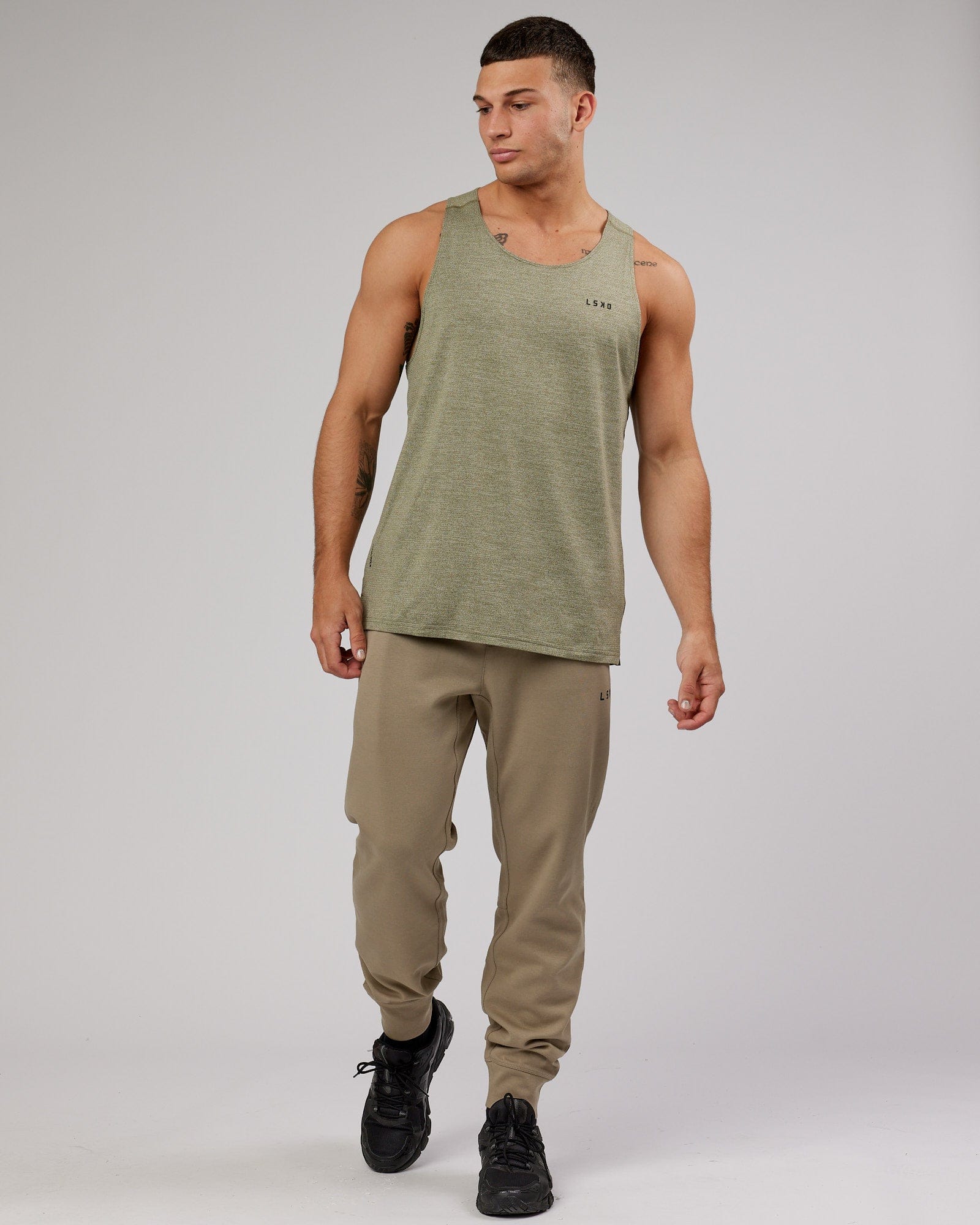 Model wearing Athlete ForgedFleece Zip Trackpant - Laurel Oak