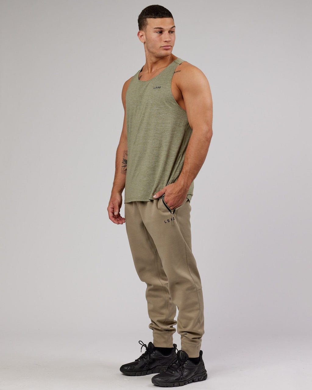 Model wearing Athlete ForgedFleece Zip Trackpant - Laurel Oak