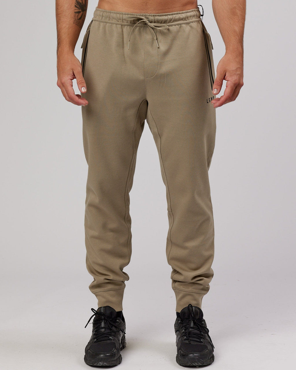 Model wearing Athlete ForgedFleece Zip Trackpant - Laurel Oak