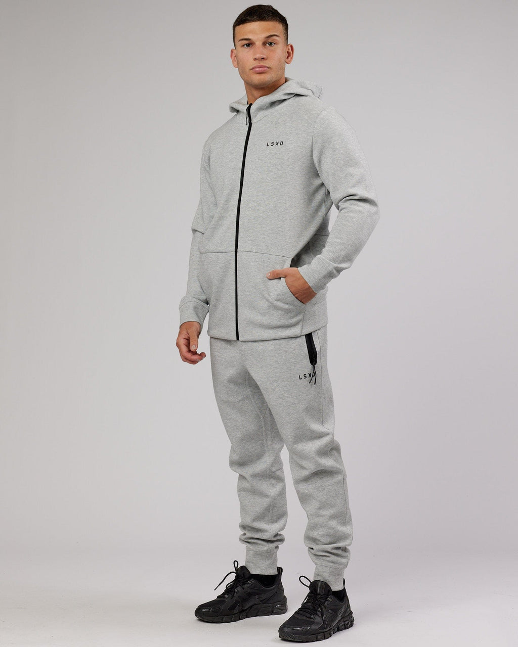 Model wearing Athlete ForgedFleece Zip Trackpant - Lt Grey Marl