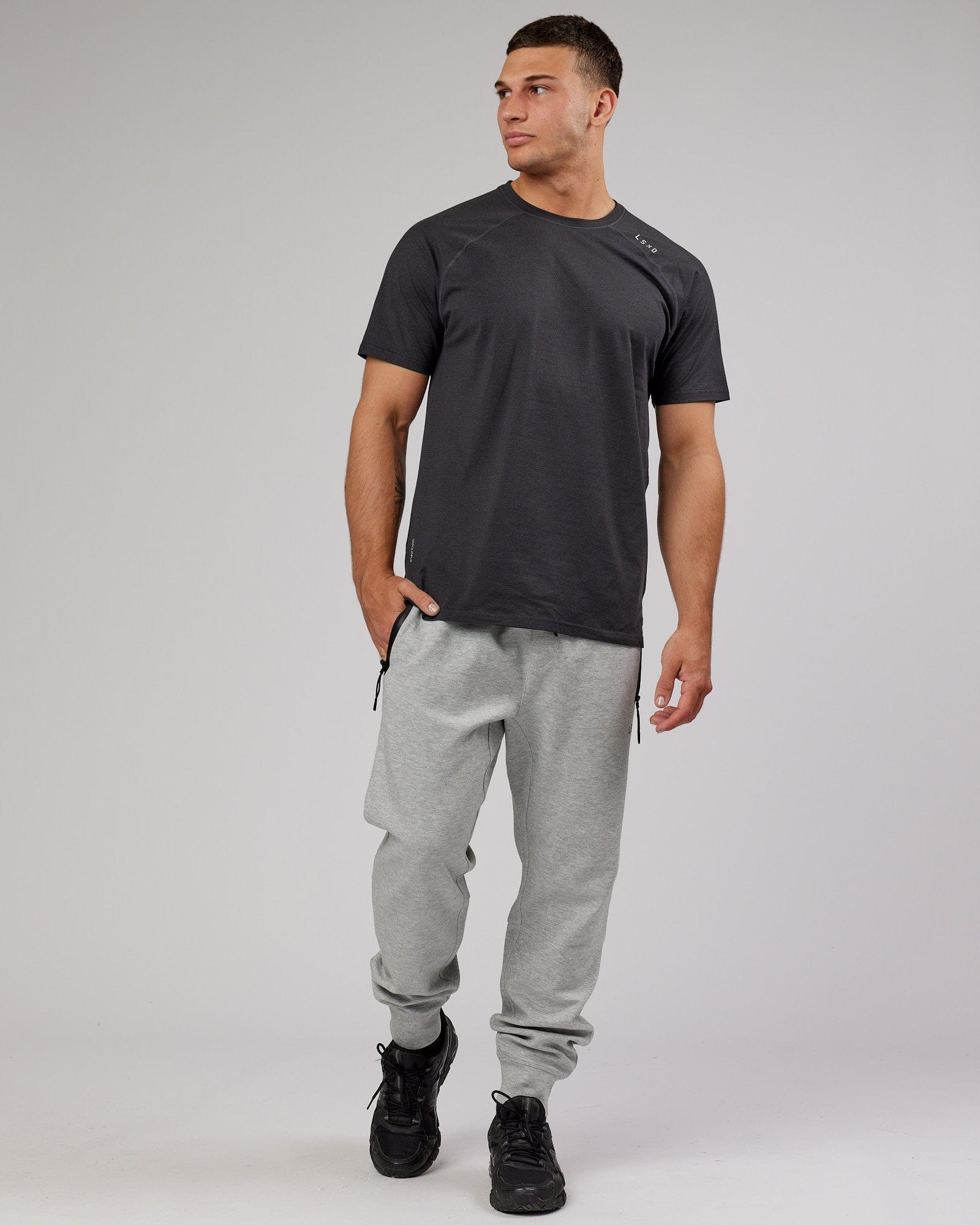 Model wearing Athlete ForgedFleece Zip Trackpant - Lt Grey Marl